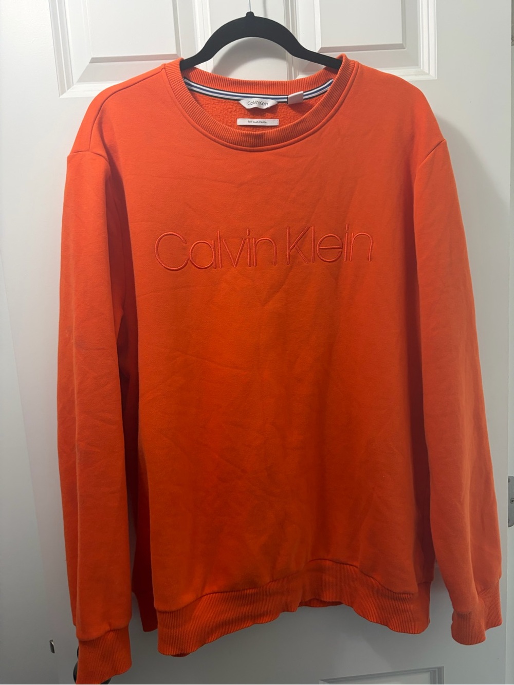 Calvin Klein Cozy Soft Touch Fleece Bright Orange Embossed Logo Sweatshirt